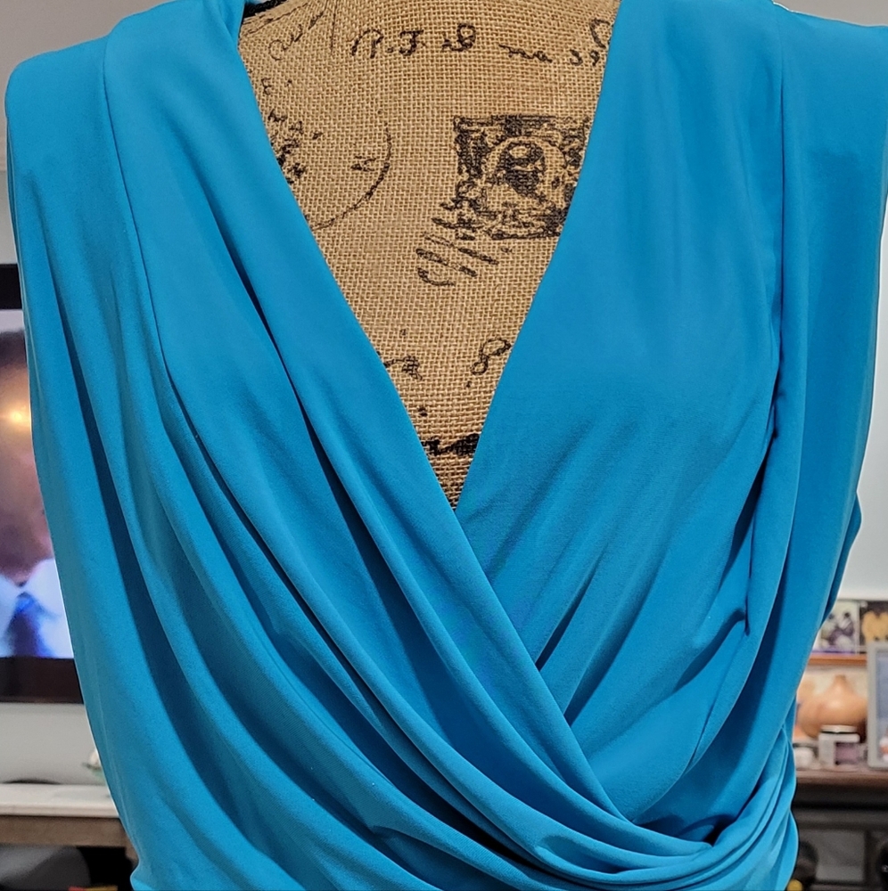 Slanted knee high dress, gathered waistline.